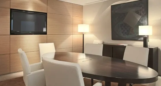 Bespoke boardroom fit-out with wall paneling and table