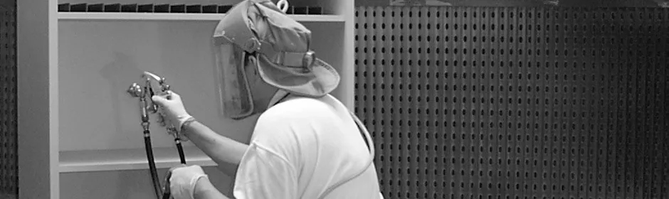 Keith Krause worker spraying furniture