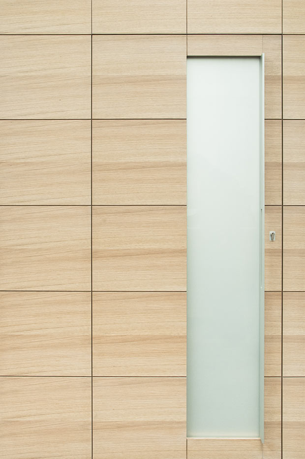 Bespoke veneer front door with glass panel